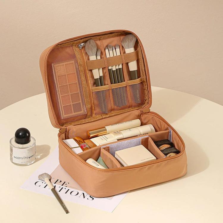 Brown makeup bag organizer with zip-top, mesh divider pocket, and brush holder slots