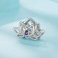 Lotus beaded bracelet with silver-toned links and purple oval gem centerpiece
