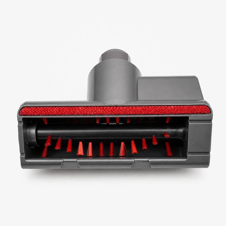 Motorized mattress tool with exposed red bristle strip and gray roller housing