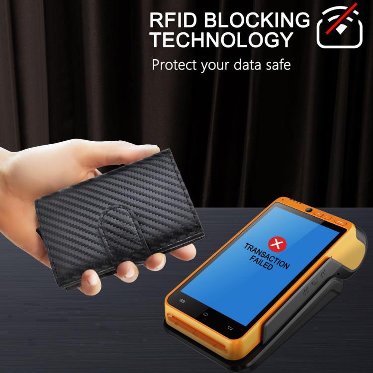 Black carbon fiber RFID pop-up card wallet held in hand