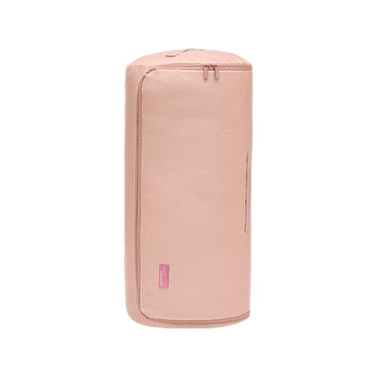 Compressible cylindrical quilt storage bag, soft pink with top zipper and handle