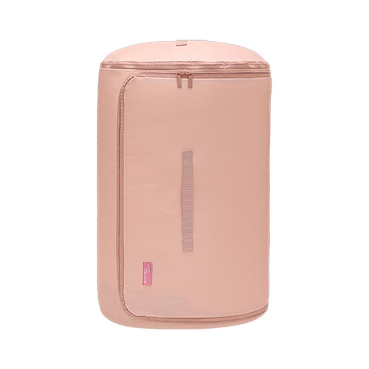 Compressible cylindrical quilt storage bag, soft pink with vertical zipper stripe