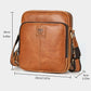 Brown leather crossbody messenger bag, front logo patch, zip closure, side strap loops.