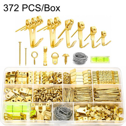 Gold picture hanging hardware kit with nails, steel wire, and hooks in a organizer tray