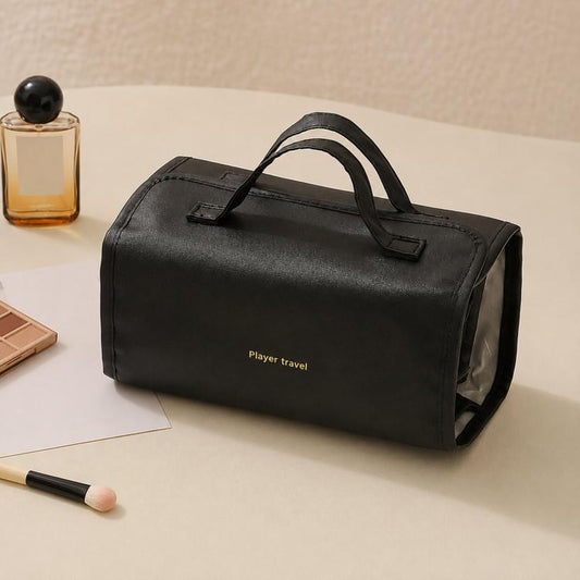 Black roll-up makeup organizer bag with carry handles and detachable clear compartments