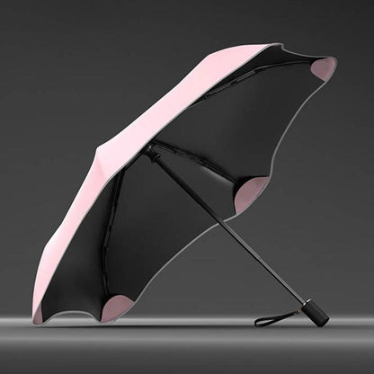 Three-fold manual sun umbrella, pink-and-black canopy with curved panels and hand strap