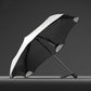 Three-fold manual sun umbrella, white outer canopy with black underside and curved panels