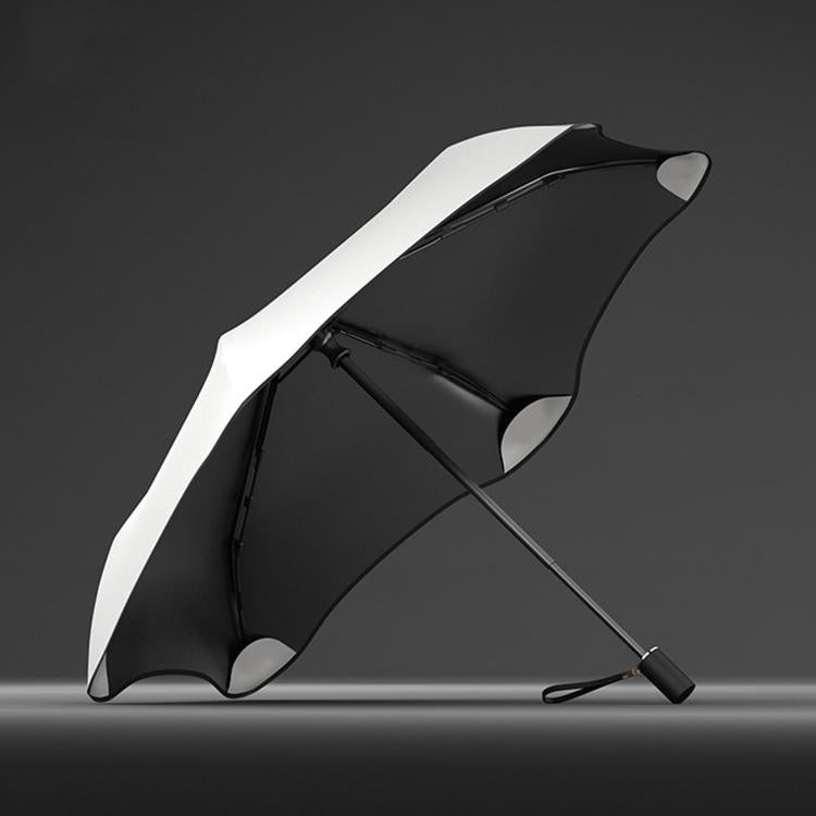 Three-fold manual sun umbrella, white outer canopy with black underside and curved panels