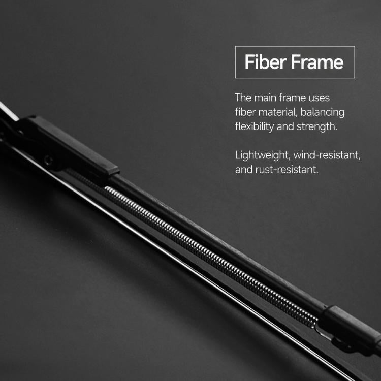 Manual umbrella frame close-up with black metal ribs and sliding mechanism