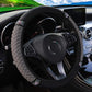 Quilted leather steering wheel cover with rhinestone trim, grey