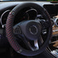 Quilted leather steering wheel cover with rhinestone trim, black and red