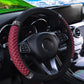 Quilted leather steering wheel cover with rhinestone trim, wine red