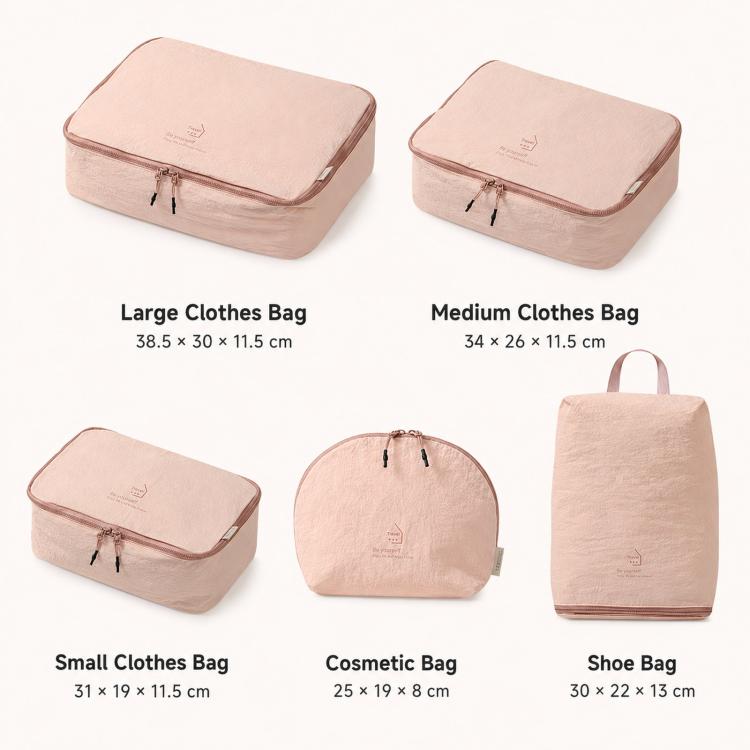 Pink packing cubes set with large, medium, small, cosmetic, and shoe bags