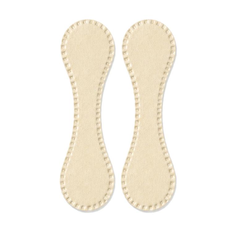 Pair of beige leather-style magnetic hem clips with stitched teardrop shape