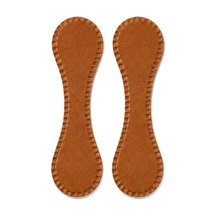 Pair of brown leather-style magnetic hem clips with stitched teardrop shape