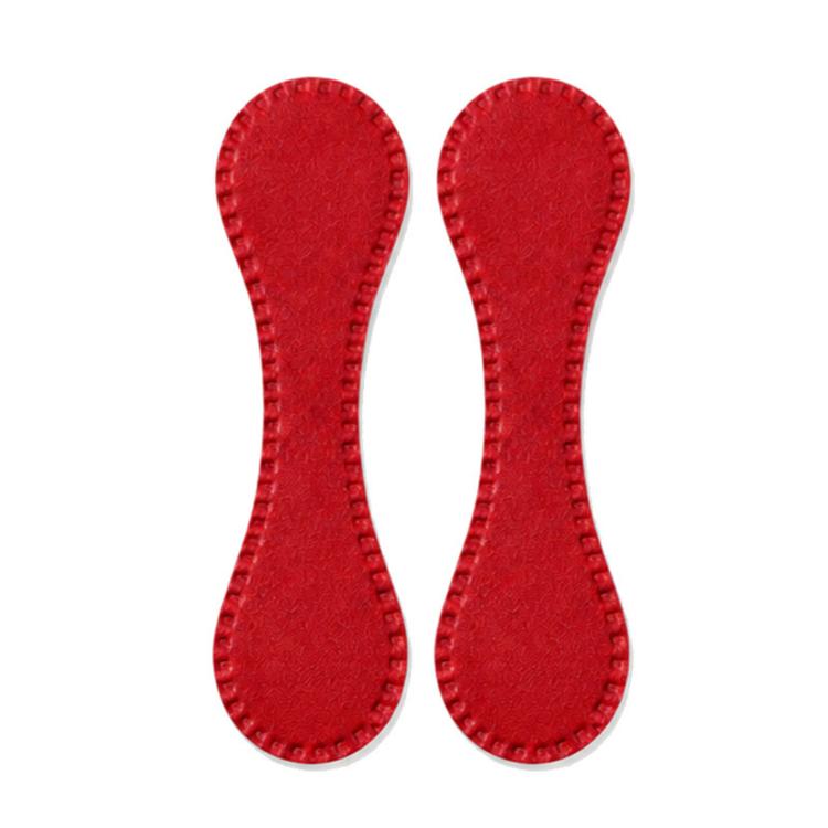 Pair of red leather-style magnetic hem clips with stitched teardrop shape