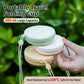 Stacked collapsible silicone travel cups with lids and lanyards in multiple colors