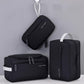 Black toiletry organizer set with multiple zip pouches and top carry handles