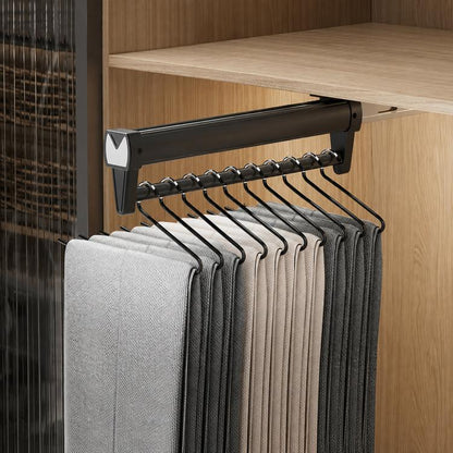 Extendable closet hanger rail with black top mount and line of S-shaped hangers