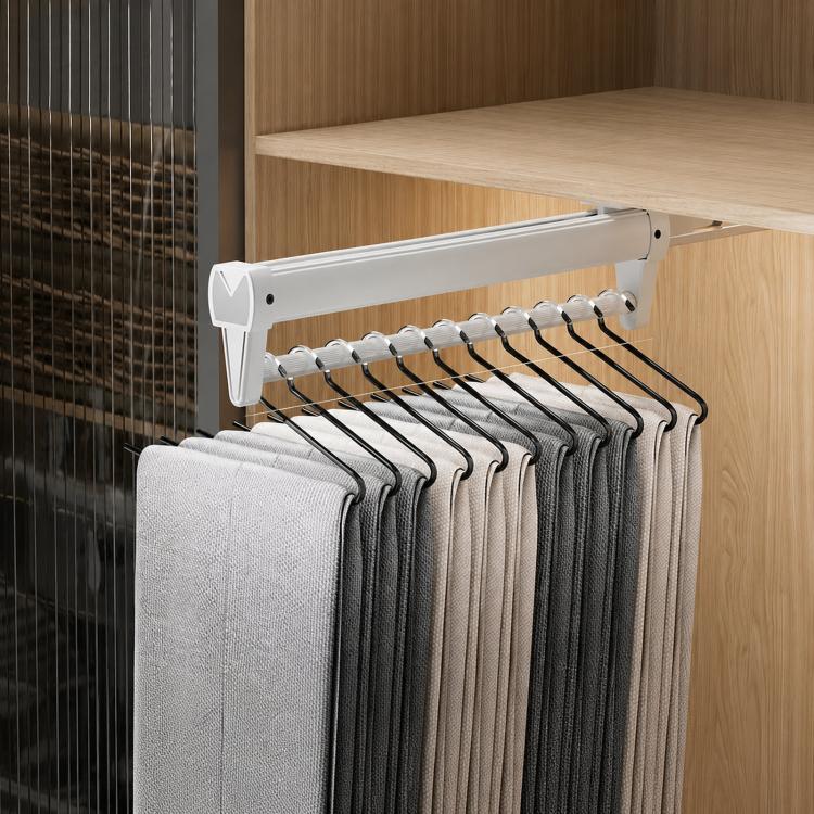 White extendable top-mount hanger rail with row of S-shaped hooks holding scarves