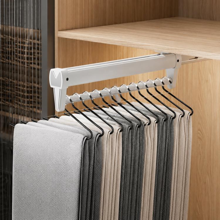 Extendable top-mount closet hanger rail, white bar with black hooks and hanging pants/scarves