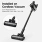 Motorized floor brush head attached to cordless vacuum wand, with clear roller and LEDs