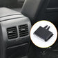 Black car AC vent grille paddle insert with angled ridged face and tabs
