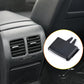 Black AC vent grille paddle insert, ridged texture on front with mounting tabs