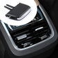 Black air vent paddle shifter insert, close-up on center dashboard vent
