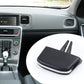 Black air vent paddle insert with two prongs shown beside car dashboard