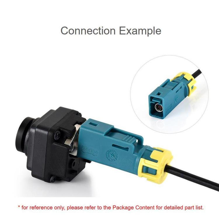 Close-up coaxial connector with teal Fakra Z female housing and black plug body, yellow latch.