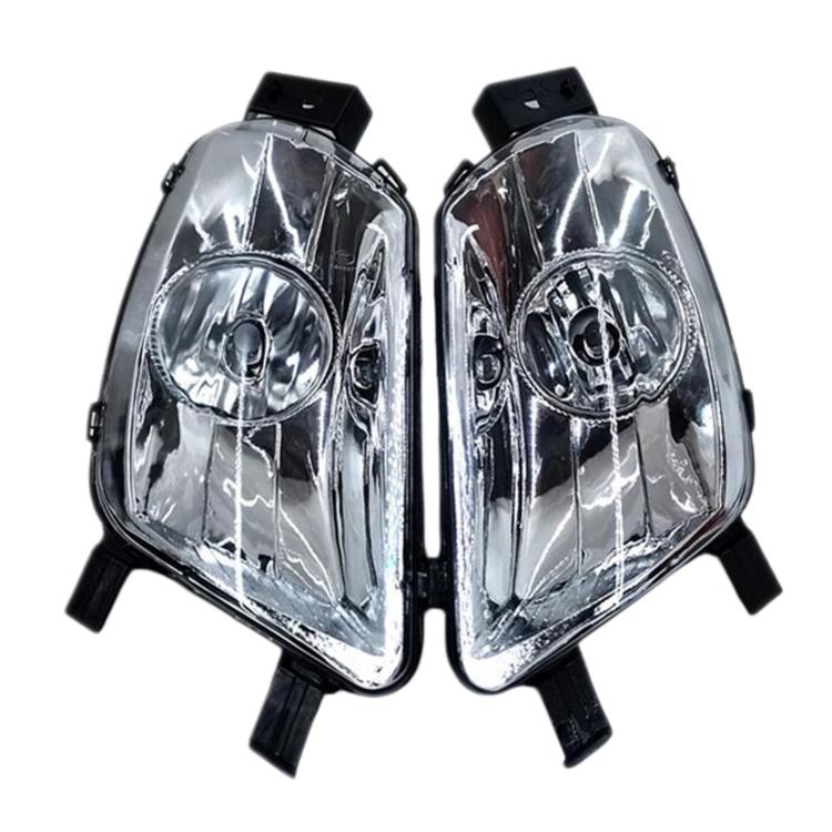 Pair of front fog lights with clear lenses, chrome reflectors, and black housings