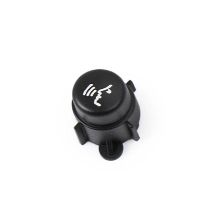 Black multifunction steering wheel button with speech/waves icon
