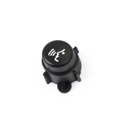Black multifunction steering wheel button with speech/waves icon