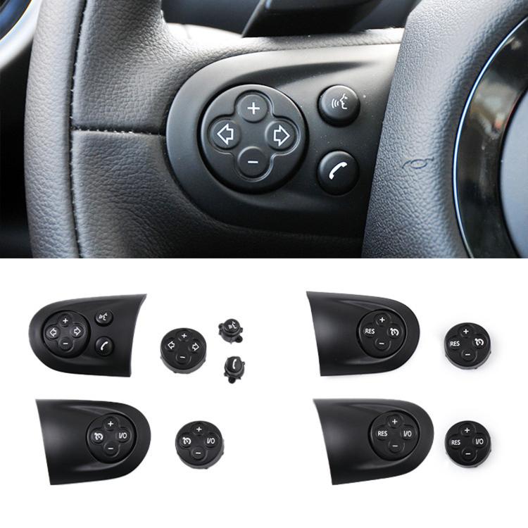 Black steering wheel control button cluster with directional, phone and voice icons