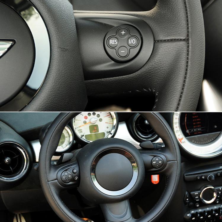 Black multifunction steering wheel buttons installed on the steering wheel spoke
