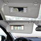 Light gray sun visor vanity mirror cover with illuminated mirror window