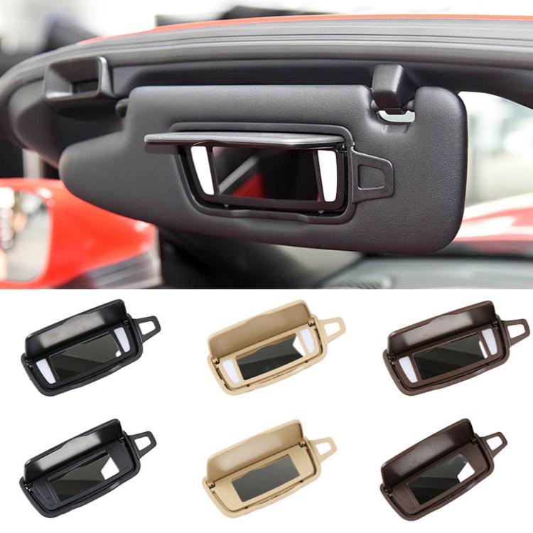 Sun visor vanity mirror showing multiple colors: black, beige, and dark brown.