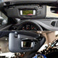 Sun visor vanity mirror installed on car interior, showing rectangular mirror window.