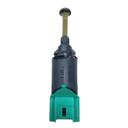 Brake light switch with green connector and black housing, metal threaded actuator pin