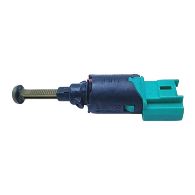 Brake light switch with green connector, black body, and long metal adjustment rod