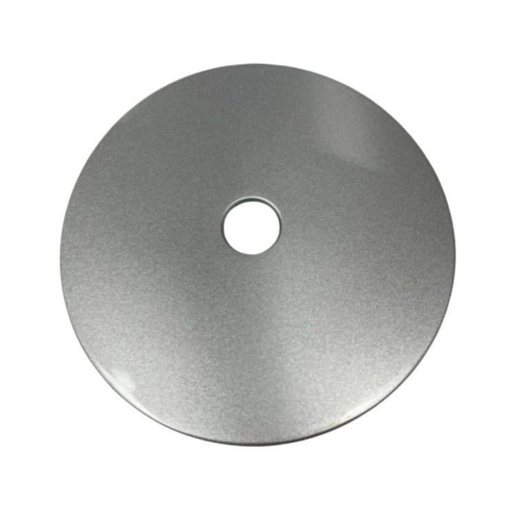 Fuel tank outer lock cover, round metal disc with central hole, brushed gray finish