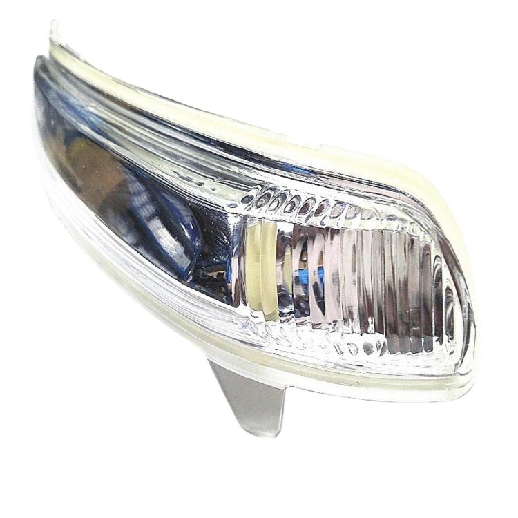 Clear turn signal lens with ribbed reflector and chrome trim