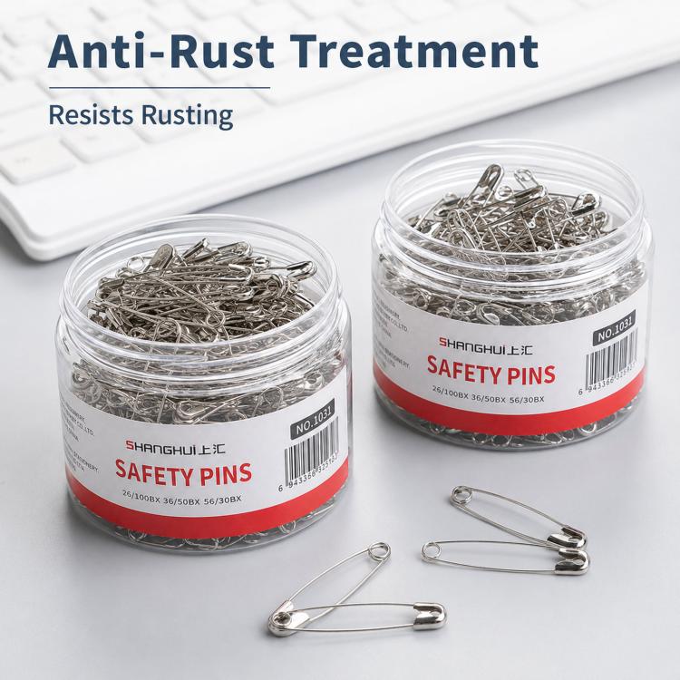 Anti-rust stainless safety pin set with two labeled jars and loose silver pins