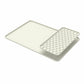 Beige silicone countertop draining mat with raised edge and textured removable insert