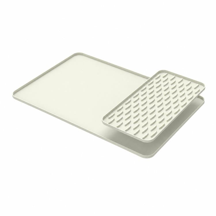 Beige silicone countertop draining mat with raised edge and textured removable insert