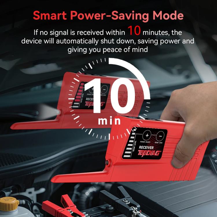 Red circuit tracer in car engine bay with clamp-like probe and hand