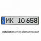 Black ABS Euro license plate frame installed on sample EU license plate with mounting holes