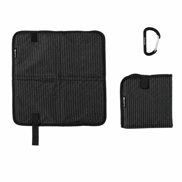 Black foldable camping seat pad with carabiner, square foam mat with carrying tab