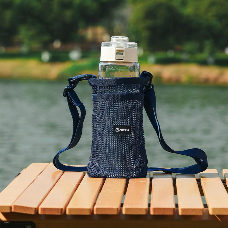 Navy mesh water bottle holder bag with adjustable shoulder strap and front pocket
